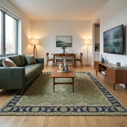Green Oushak floral animal pattern hand-knotted wool area rug with sage green field and navy border