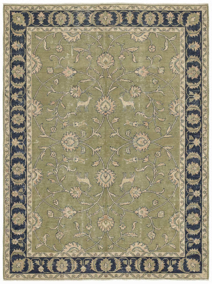 Green Oushak floral animal pattern hand-knotted wool area rug with sage green field and navy border