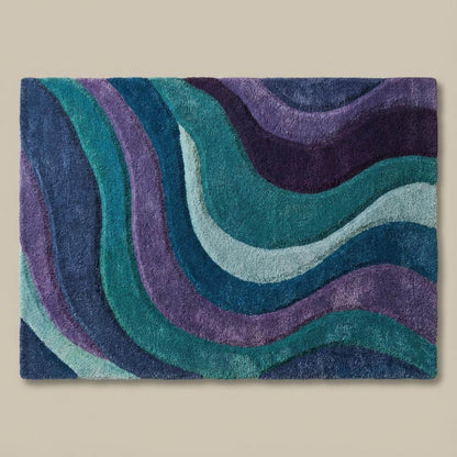 Blue, teal, mint, and purple color palette of a modern abstract area rug designed to complement mid-century interiors. __etsy:7543976004