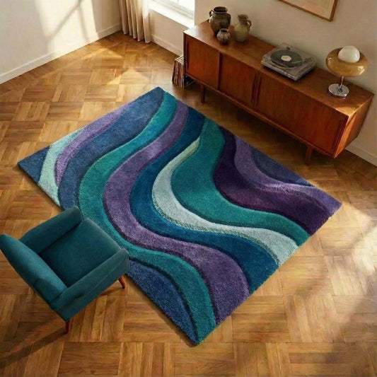 Hand tufted retro abstract wave area rug with plush high-pile texture in teal, blue, purple, and mint tones
