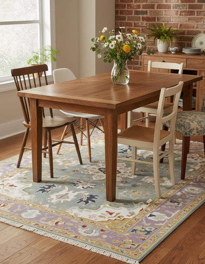 Hand-tufted wool area rug with vintage-inspired pastel medallion and boho Persian style design