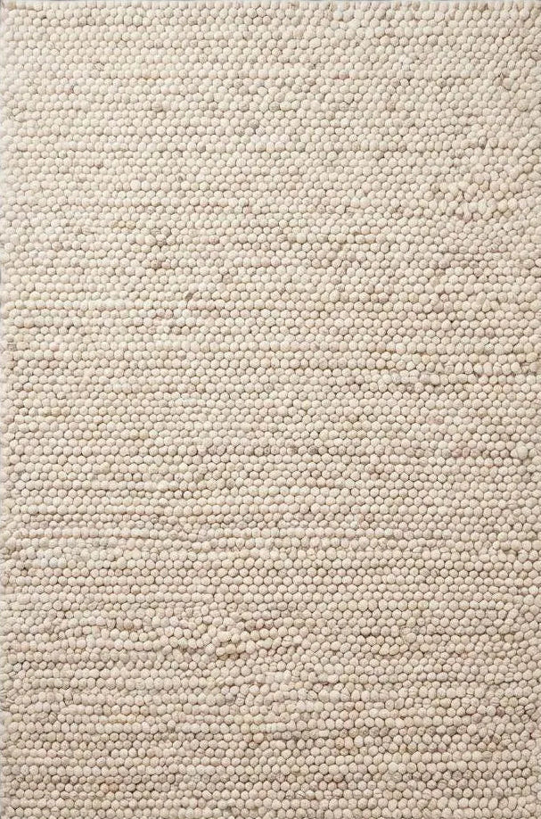 Handmade felt ball wool rug in neutral ivory with chunky texture for Scandinavian home decor