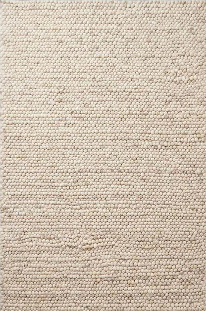 Handmade felt ball wool rug in neutral ivory with chunky texture for Scandinavian home decor
