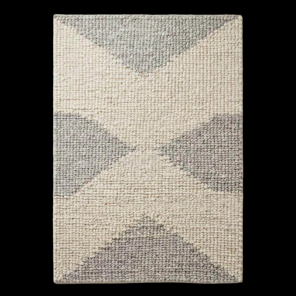 Handwoven chunky wool rug in neutral cream, beige, and gray tones with chunky weave and subtle geometric pattern for Scandinavian and minimalist interiors