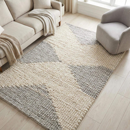 Handwoven chunky wool rug in neutral cream and beige tones with geometric pattern for Scandinavian decor