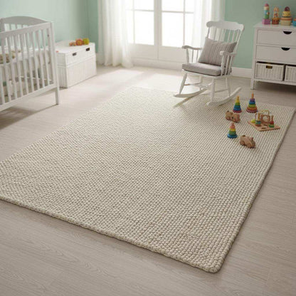 Handwoven Neutral Wool area rug in a soft natural beige color with loop texture, perfect for cozy minimalist interiors.
