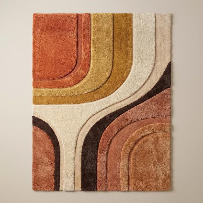 Mid Century Modern abstract hand-tufted area rug with terracotta, mustard, and cream geometric design