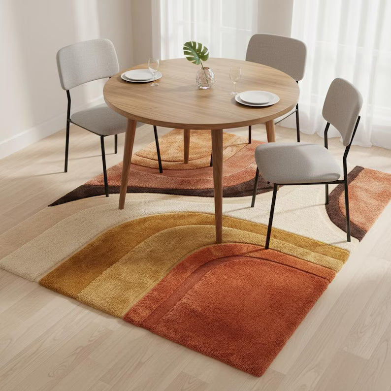 Mid Century Modern abstract hand-tufted area rug with terracotta, mustard, and cream geometric design