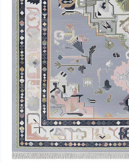 Soft gray Oushak rug with pastel geometric medallion and hand-tufted wool texture