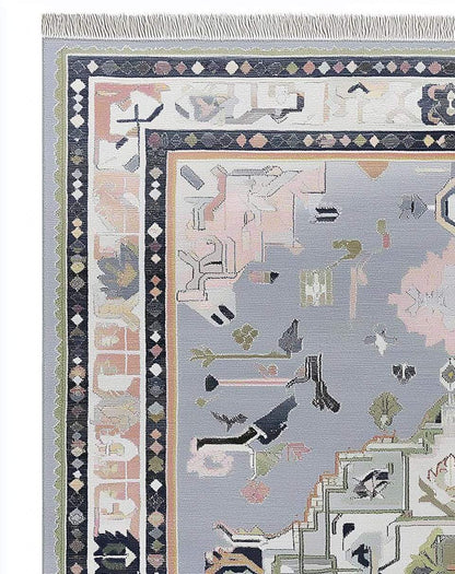 Soft gray Oushak rug with pastel geometric medallion and floral motifs, hand-tufted wool, ideal for minimalist and transitional interiors