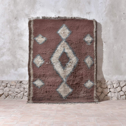Vintage hand-woven Moroccan rug with brown, cream diamond Berber design and subtle blue accents