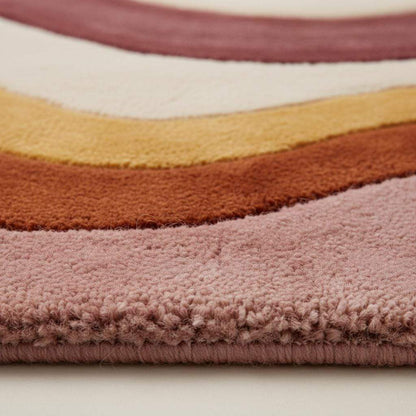 Retro wavy area rug with colorful 70s wave pattern and soft tufted wool texture