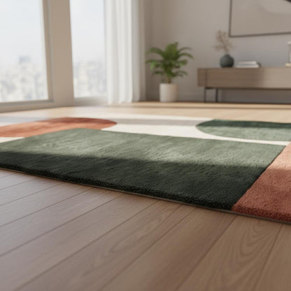 Modern geometric rug in terracotta, green, and cream with plush wool tufted texture for living rooms