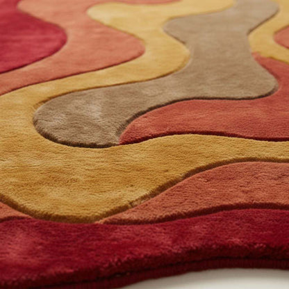 Statement mid century modern rug in bold warm tones, perfect for boho or retro home décor, shown in a stylish reading nook.