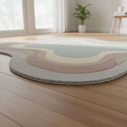 Hand-tufted handmade wool rug with organic shape and soft plush texture for living room decor