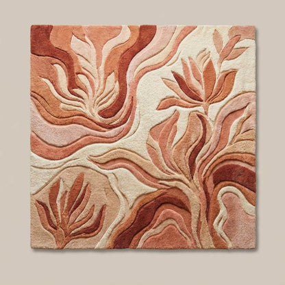 Boho living room rug with sculpted high low pile design in blush rust and beige palette
