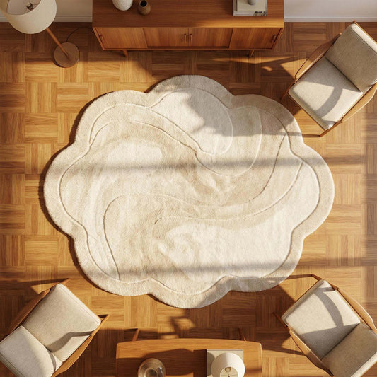 Neutral organic cloud area rug with soft plush texture and sculptural abstract design for modern living room or nursery decor