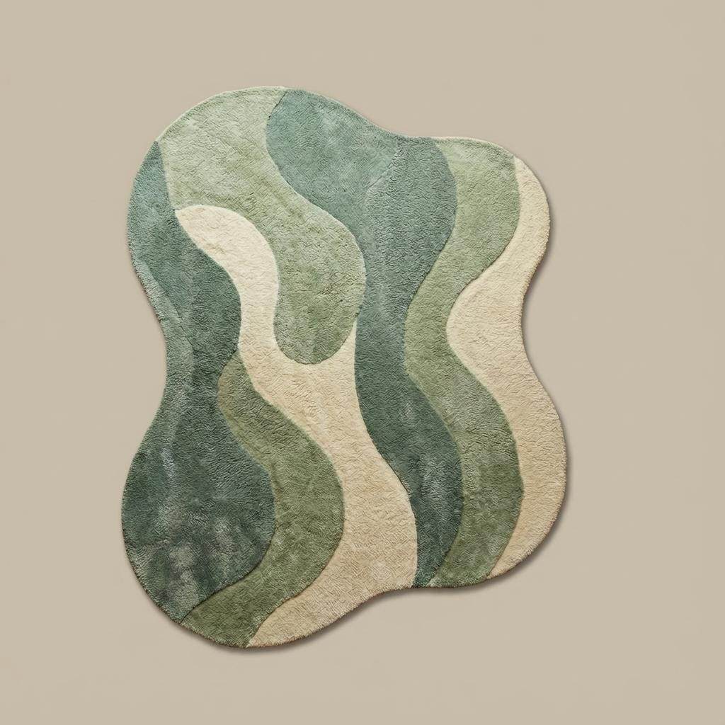 Modern green abstract rug with wavy organic design, soft tufted texture on wood flooring