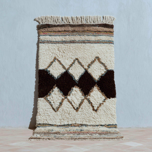 Handwoven Moroccan wool rug with high-pile diamond pattern in cream and brown