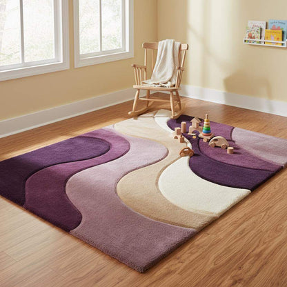 Soft abstract area rug styled in a nursery space, emphasizing plush comfort, calming neutral colors, and family-friendly softness suitable for kids’ rooms.