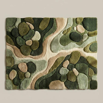 Top-down view of abstract green area rug displaying full organic pattern, flowing lines, and earth tone color palette with textured pile design for modern and nature-inspired interiors.