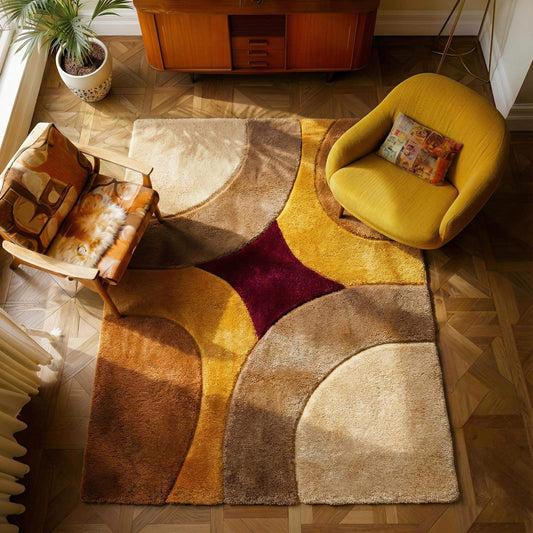 Retro geometric rug with plush shag pile in warm gold, beige, and burgundy tones for mid century modern decor