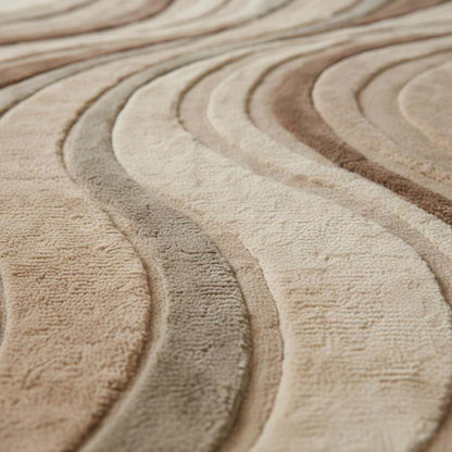 Neutral earth tone modern sculpted wave rug with 3D carved design, plush hand tufted wool blend carpet for living room decor