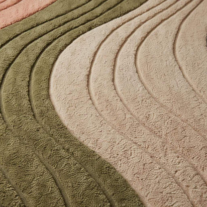 Beige modern wavy area rug with textured sculpted wave pattern and plush high pile carpet for living room decor