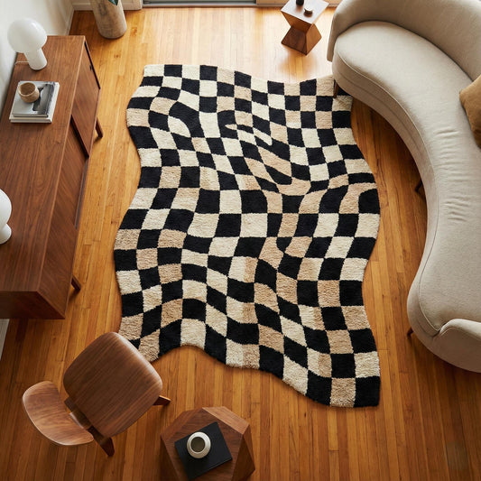 Wavy checkered rug with black and beige optical illusion pattern, plush high pile carpet for modern home decor