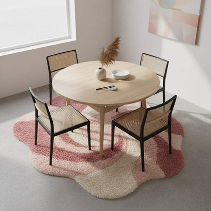 Plush abstract pink rug with curved organic design adding warmth to a contemporary interior