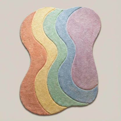 Soft pastel boho rug with curved silhouette for bedroom or nursery