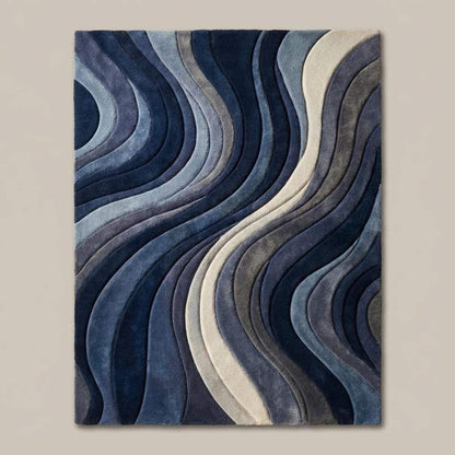 Navy and gray sculpted wave rug featuring high low pile design for modern home decor