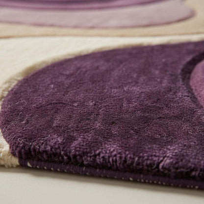 Modern abstract rug with plush wavy pattern in neutral mauve tones for contemporary interiors