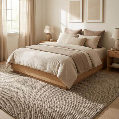 Chunky wool rug in neutral beige with thick loop weave for cozy minimalist Scandinavian decor