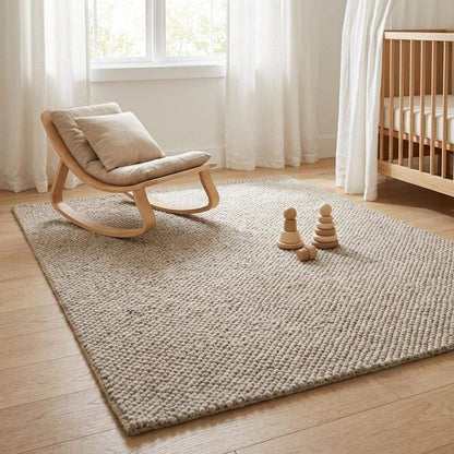 Chunky wool rug with thick loop weave in neutral beige for cozy Scandinavian living room decor