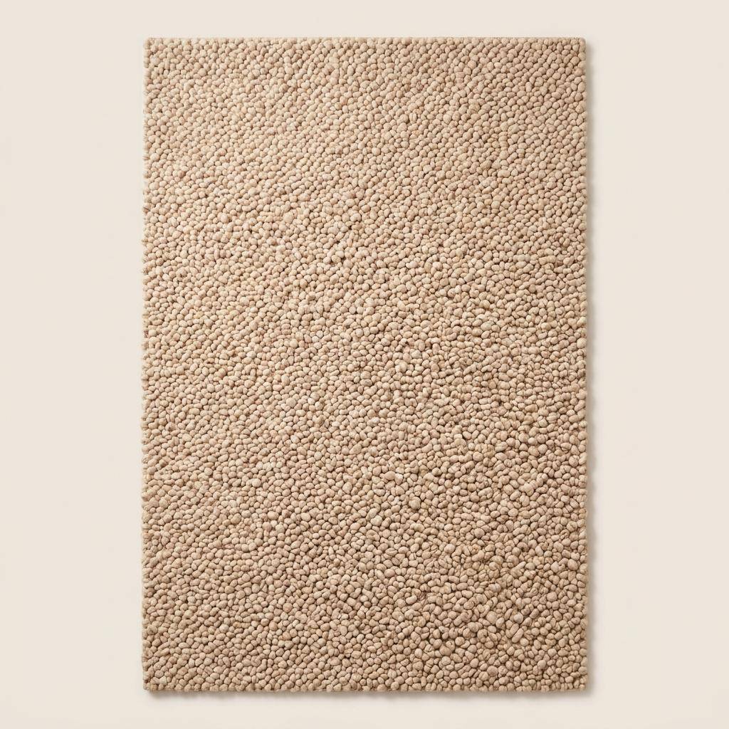 Chunky wool rug handwoven beige thick loop pile cozy minimalist textured floor carpet