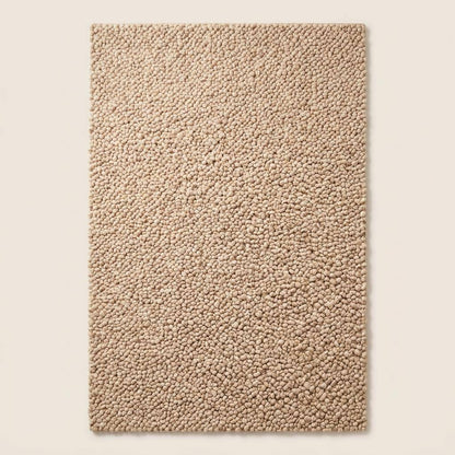 Chunky wool rug handwoven beige thick loop pile cozy minimalist textured floor carpet