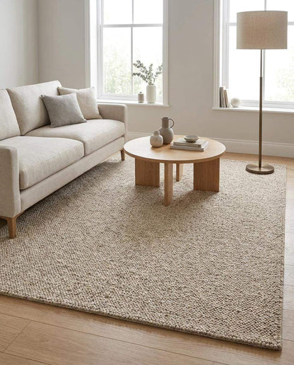 Chunky wool loop rug in neutral beige with textured, handmade design for cozy minimalist interiors