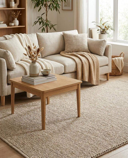 Chunky wool loop rug in neutral beige with textured, cozy handmade design for minimalist interiors