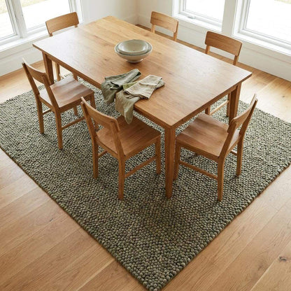 Handwoven chunky wool rug with pebble texture in neutral tones for Scandinavian and modern farmhouse decor