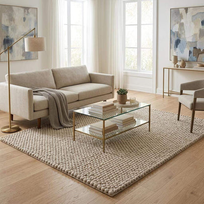 Handwoven chunky wool pebble rug in ivory with thick texture for modern minimalist home decor