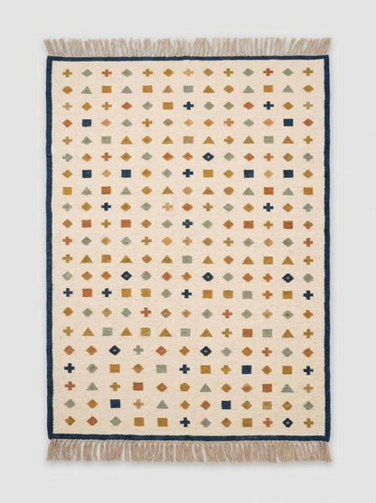Ivory wool flatweave kilim rug with navy border and geometric motifs