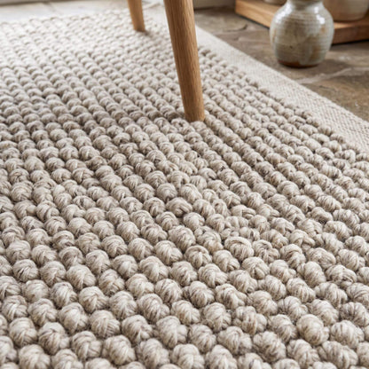 Chunky loop wool rug hand woven ivory beige textured Scandinavian living room rug