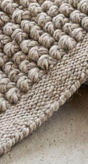 Chunky loop wool rug hand woven ivory beige textured Scandinavian living room
