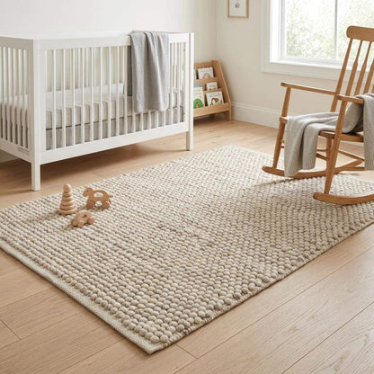 Handwoven pebble weave wool area rug in ivory beige with textured chunky loops for living room decor