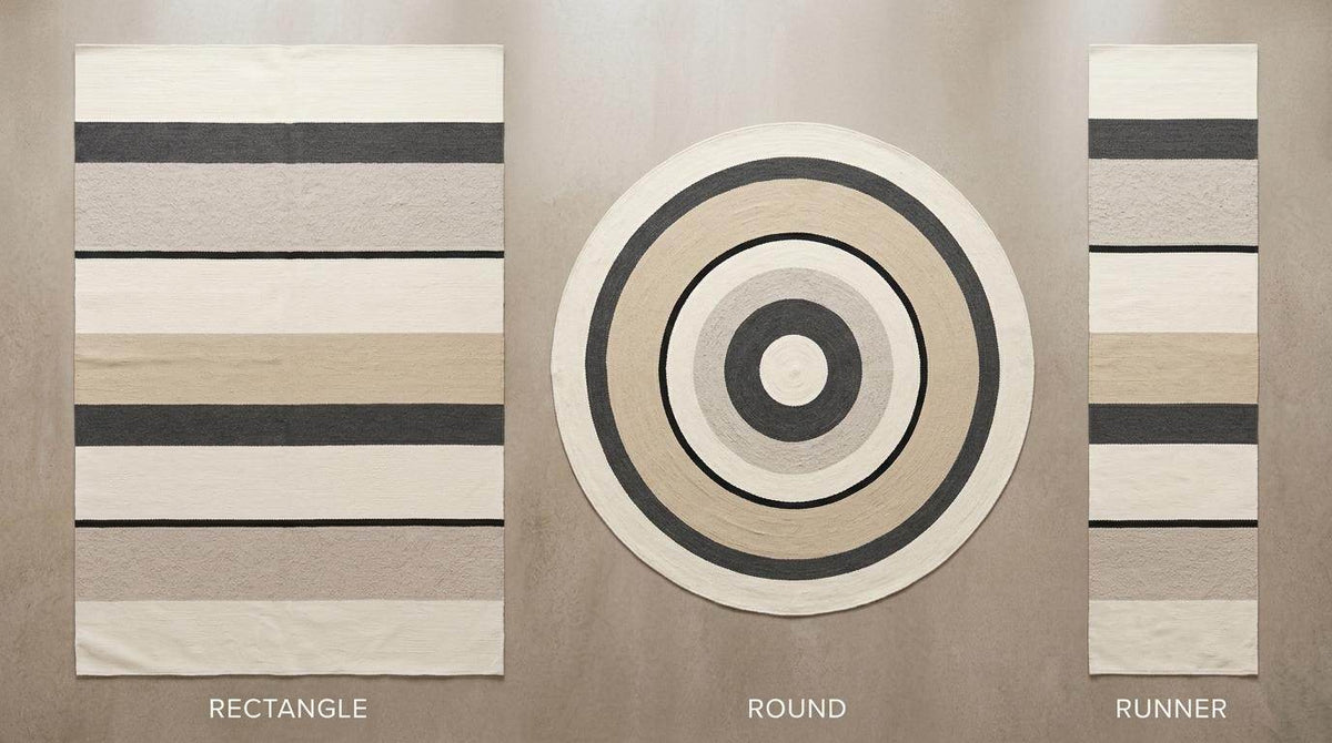 Ivory black striped flatweave wool rug with charcoal, greige, and camel tones in Scandinavian modern style