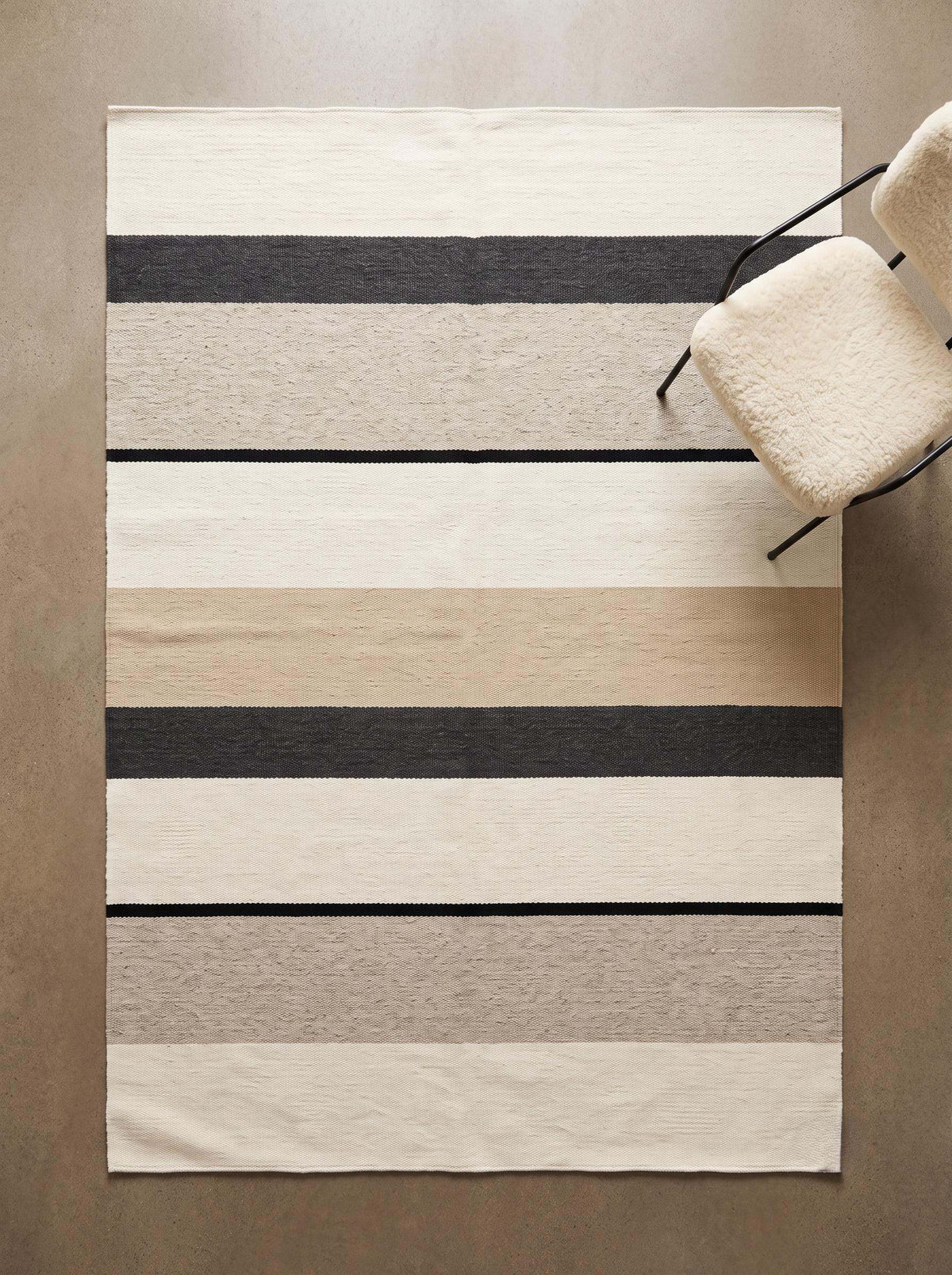 Ivory black striped flatweave wool rug with handcrafted Scandinavian modern design