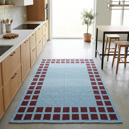 Handwoven sky blue dhurrie rug with maroon square border flatweave wool carpet