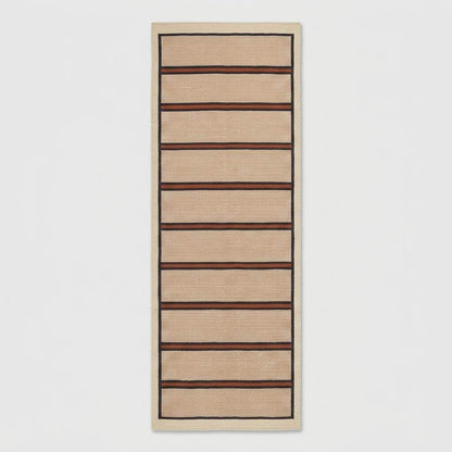 Handwoven wool flatweave runner rug with ivory, navy, and rust stripes for kitchen or hallway