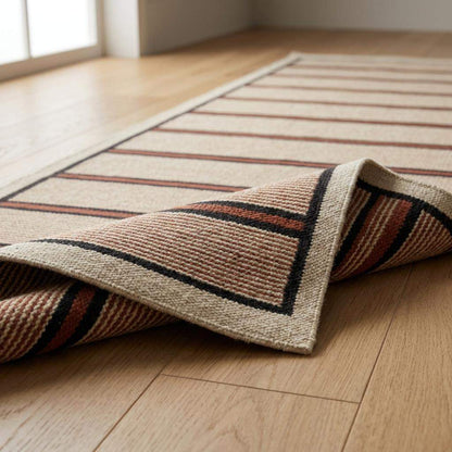 Handwoven wool flatweave runner rug in ivory with navy and rust stripes for kitchen or hallway